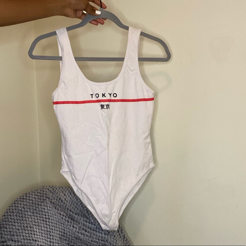 White, red and black bodysuit